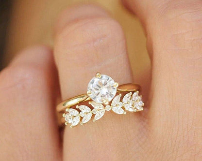 Gold ring with diamond on a finger