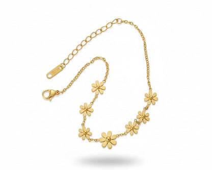 Gold floral bracelet on a white background