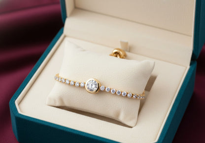 Diamond ring in a jewelry box on a red fabric background